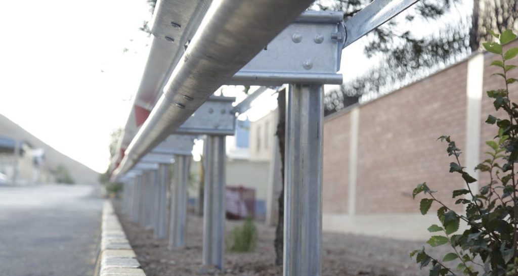 Heavy-duty steel guardrail on a bridge approach